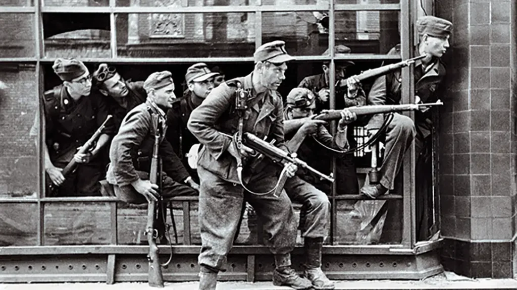 The German MP40 worked well in urban settings. Here members of the SS hold a position in a townhouse in Warsaw, Poland, in August of 1944 during the “Warsaw Uprising.”
