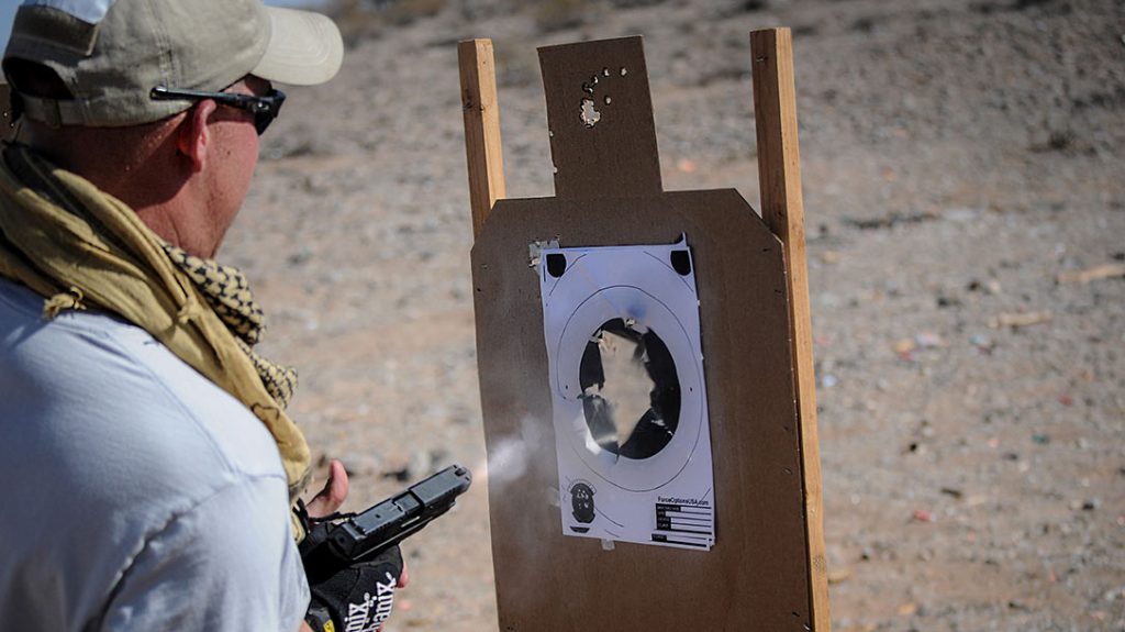 Close quarters combat shooting practice.